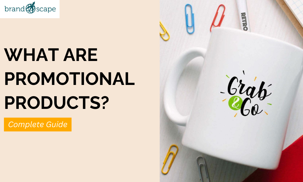 Infographic image showing a white ceramic mug, placed beside colorful paper clips, representing Brandscape’s complete guide on promotional products