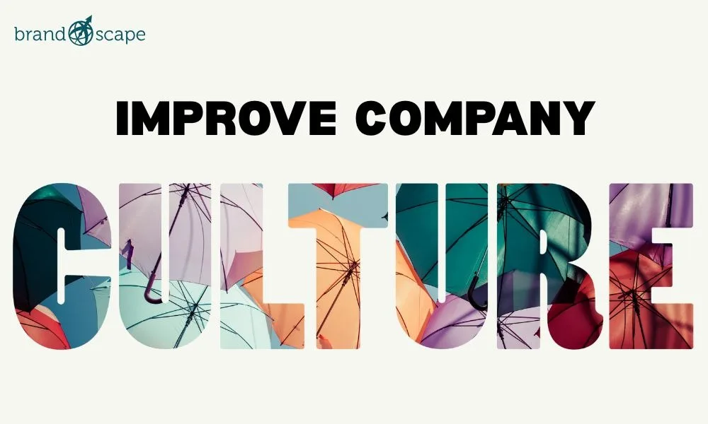 A BrandScape graphic with the text ‘Improve Company Culture.’ The word ‘Culture’ is written in large bold letters filled with colorful umbrella patterns, representing diversity and togetherness.